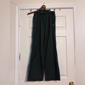 Nike black and teal wind pants, size small